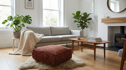 view of vintage Moroccan rug pouf terracotta red in scandinavian living room