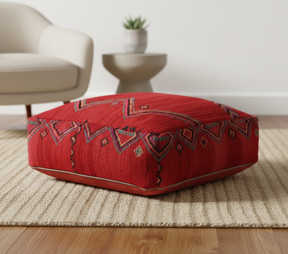 close-up view of vintage Moroccan kilim pouf red tribal in living room