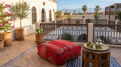 view of vintage Moroccan red kilim pouf cover 60x60 cm used as a floor cushion