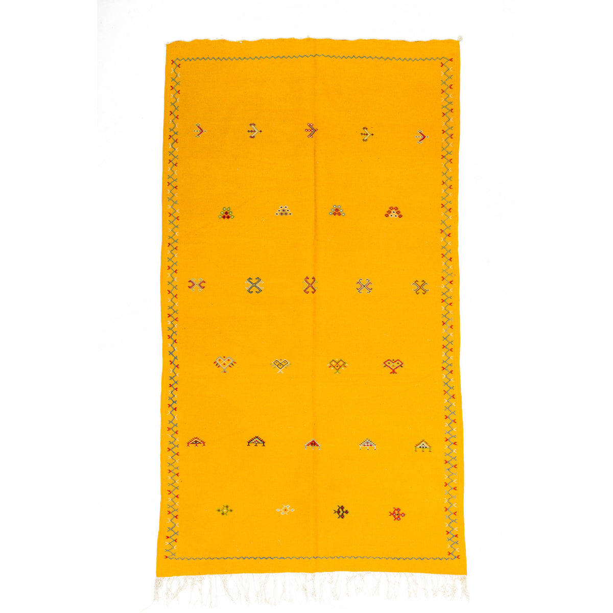 A bright yellow Moroccan wool rug with a hand-woven geometric border and small colorful embroidered motifs, shown flat against a white background.