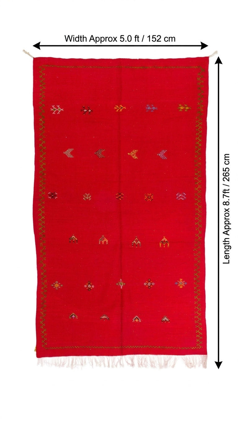 A red woven moroccan rug with small multicolor embroidered motifs and fringe, shown flat on a white background with dimension arrows indicating width about 5.0 ft (152 cm) and length about 8.