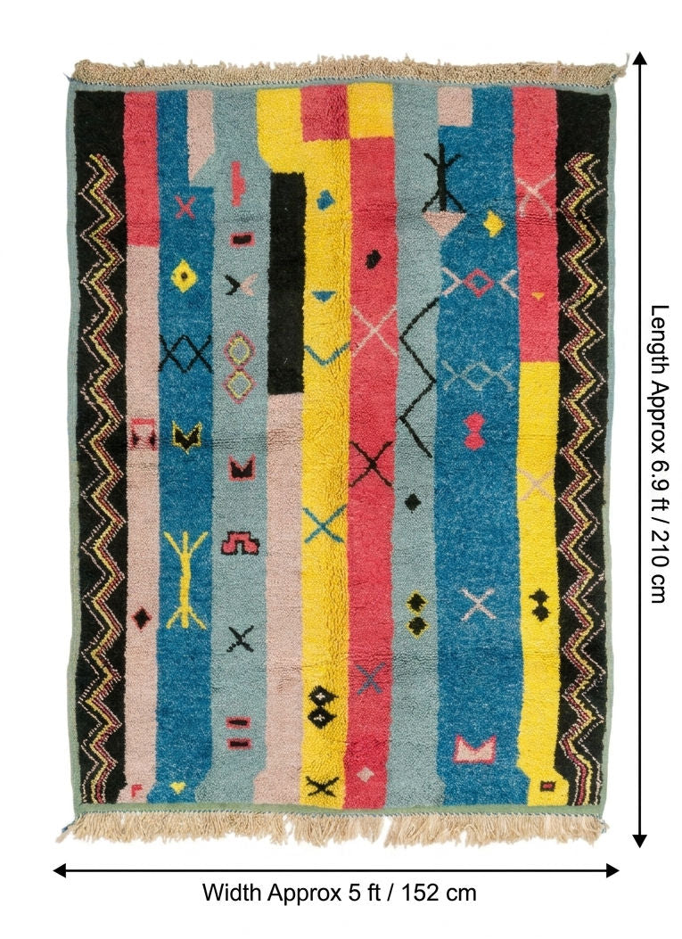 A colorful hand-knotted moroccan rug with vertical stripes in blue, yellow, pink, black, beige, and gray, featuring geometric patterns and fringe on the top and bottom. Measurement arrows and text indicate a length of approximately 6.