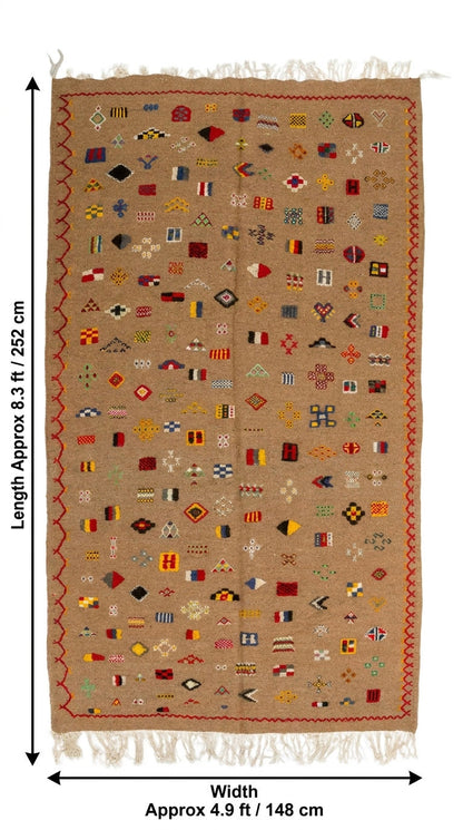 A rectangular woven rug with fringe on the top and bottom, shown flat against a white background with dimension arrows.