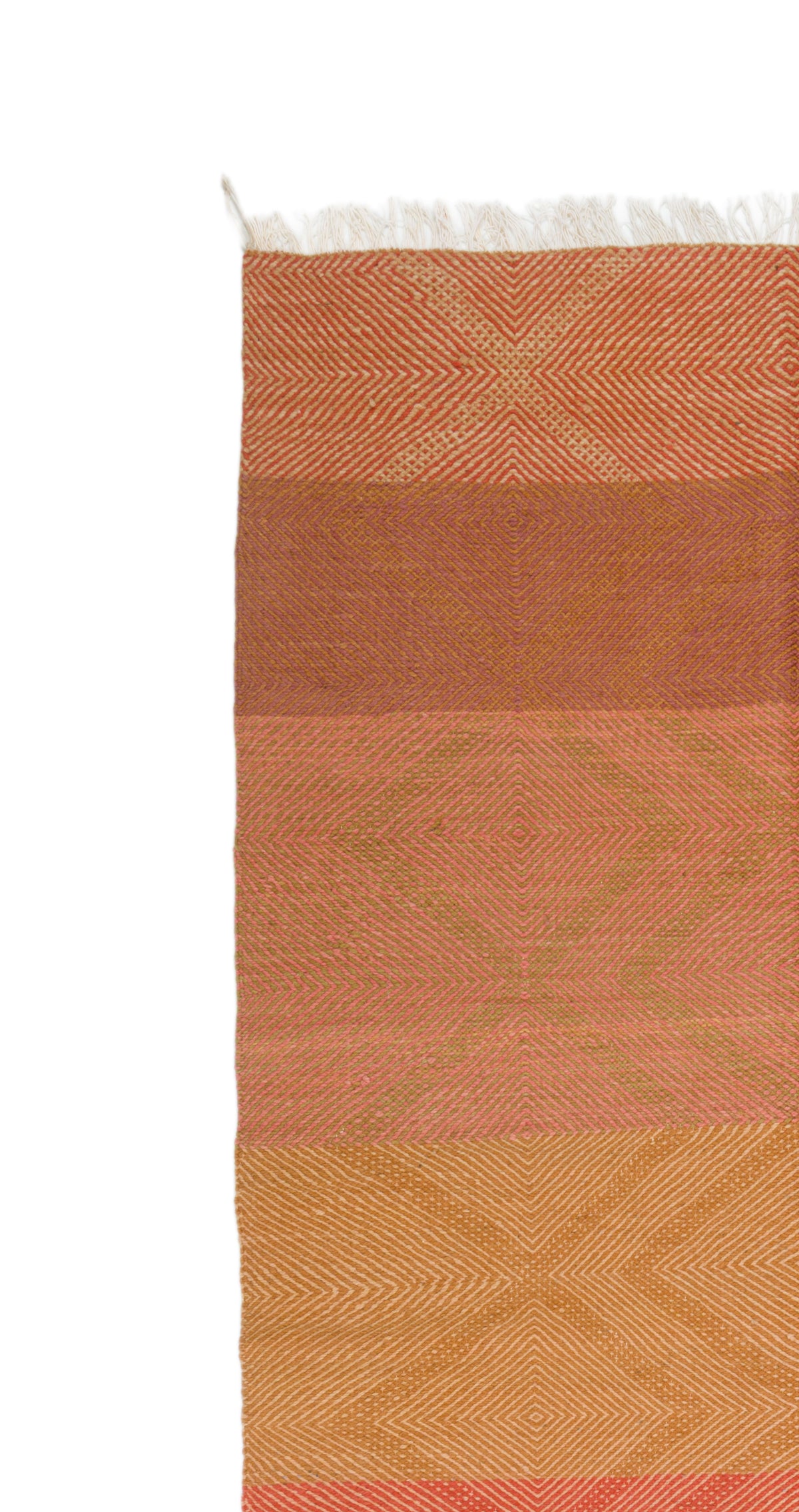 A close-up of a Zanafi rug with horizontal bands in terracotta, rust, peach, and golden yellow, featuring a subtle geometric pattern and white fringe at the top, shown against a plain white background.
