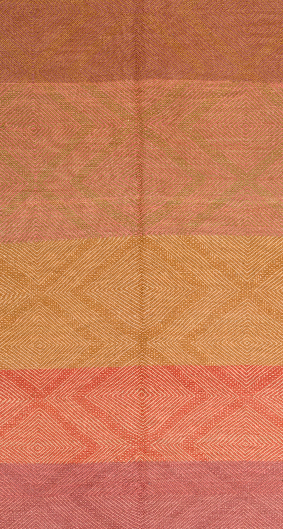 A close-up of a Moroccan Zanafi rug with horizontal bands of muted orange, tan, and coral pink, each featuring a subtle diamond pattern.