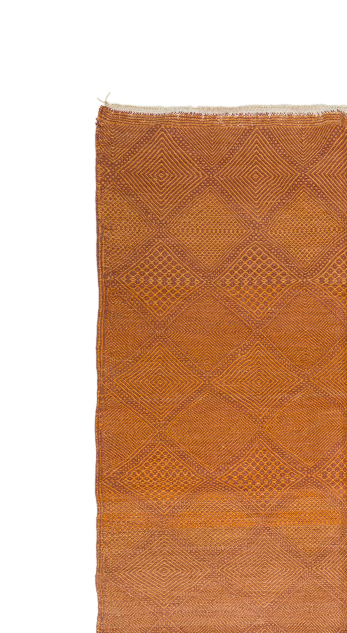 A close-up of a woven textile or rug in warm rust orange with a subtle diamond pattern, shown against a plain white background.
