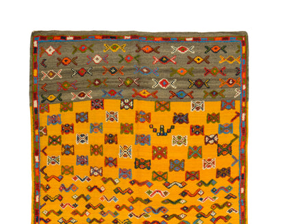 Moroccan wool rug was handwoven by Berber women artisans in the Atlas Mountains of Morocco using traditional rug-making techniques.

