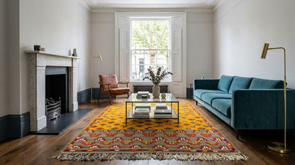 Moroccan wool rug handwoven  100% hand-spun wool, it combines a flatwoven base with raised, delicately hand-knotted tribal motifs. The striking design features a vibrant yellow central field framed by natural beige-grey wool at both ends, accented throughout with multicoloured knotted details in red, blue, green, orange, and white. 