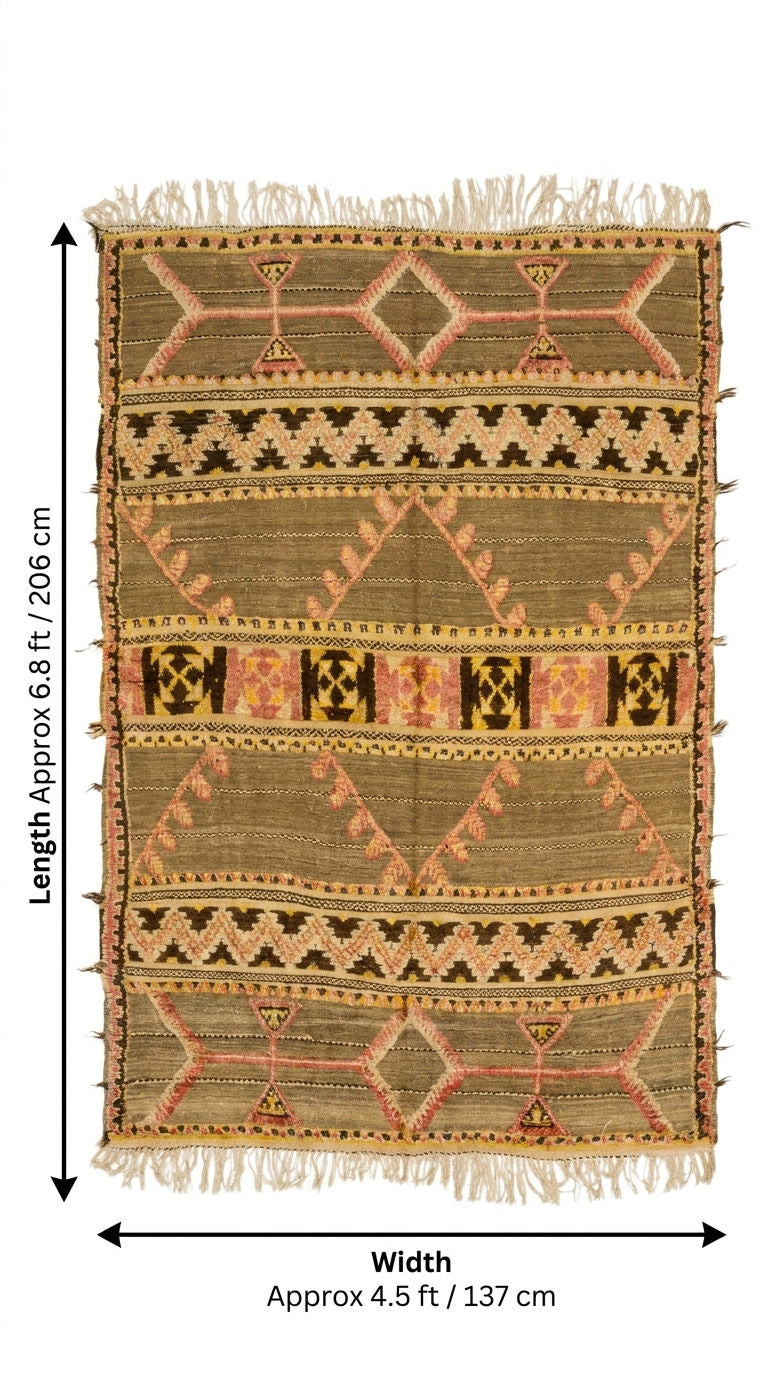 A flat-lay view of a rectangular woven kilim rug with fringe on the top and bottom edges, showing its geometric patterns and dimensions with black measurement arrows and text indicating approximately 6.8 ft by 4.5 ft.