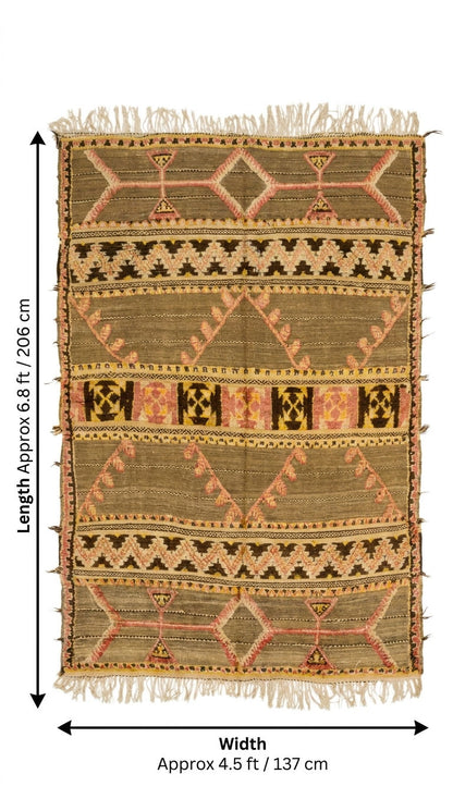 A flat-lay view of a rectangular woven kilim rug with fringe on the top and bottom edges, showing its geometric patterns and dimensions with black measurement arrows and text indicating approximately 6.8 ft by 4.5 ft.