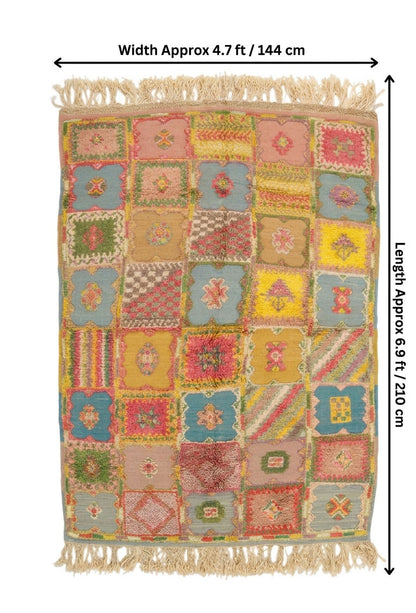A multicolor patchwork-style woven moroccan rug with fringe on all sides, shown flat against a white background with dimension arrows indicating width approximately 4.7 ft (144 cm) and length approximately 6.