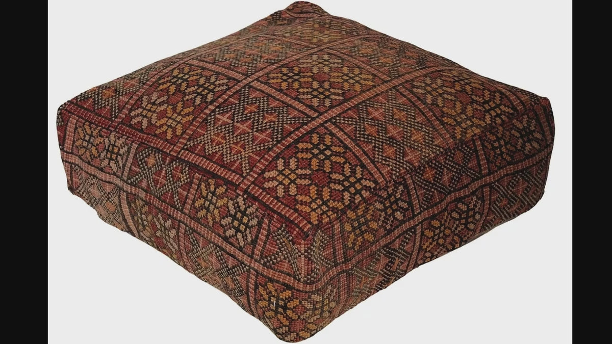 Video of vintage Moroccan rug pouf terracotta red showing texture and Berber details 