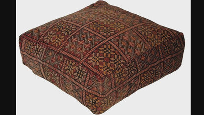 Video of vintage Moroccan rug pouf terracotta red showing texture and Berber details 