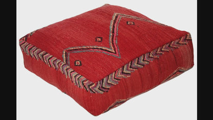 Video of vintage Moroccan kilim pouf red tribal showing texture and Berber details 