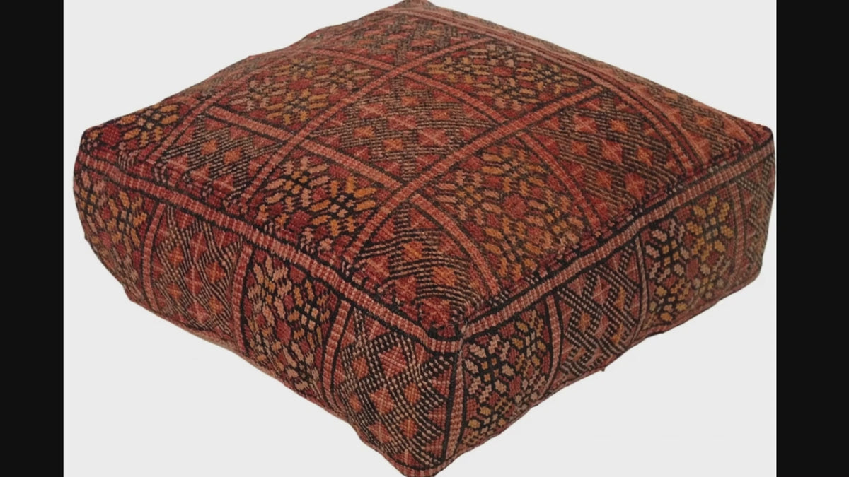 Video of vintage Moroccan rug pouf terracotta red showing texture and Berber details 
