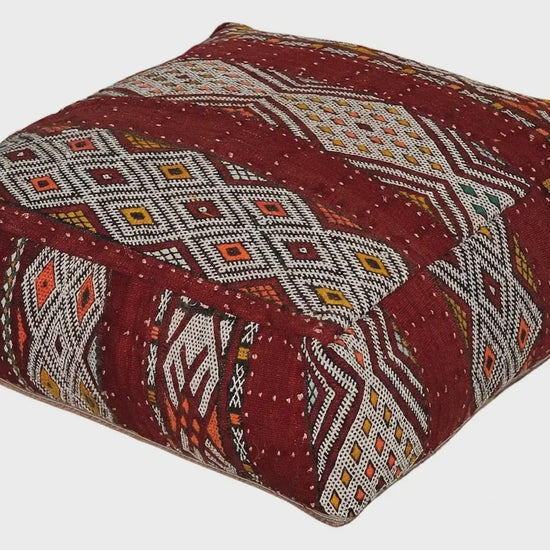 Video of vintage Moroccan tribal red kilim pouf cover showing texture and Berber details 