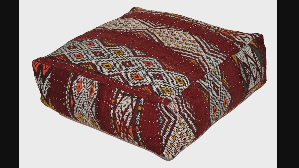 Video of vintage Moroccan tribal red kilim pouf cover showing texture and Berber details 