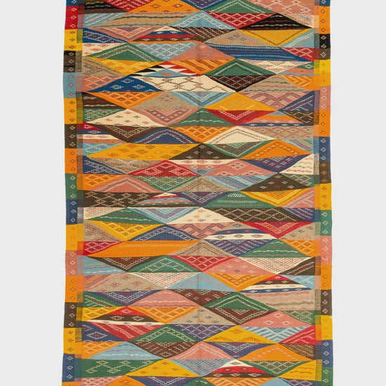 video of a cubist moroccan rug on a white background