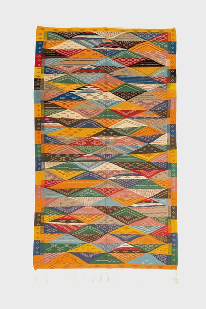 video of a cubist moroccan rug on a white background