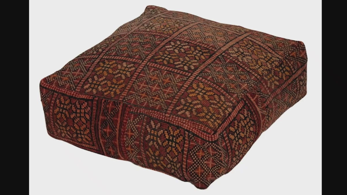 Video of vintage Moroccan rug pouf terracotta red showing texture and Berber details 