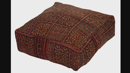 Video of vintage Moroccan rug pouf terracotta red showing texture and Berber details 