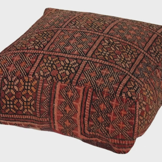Video of vintage Moroccan rug pouf terracotta red showing texture and Berber details 
