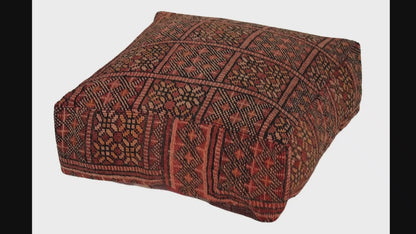 Video of vintage Moroccan rug pouf terracotta red showing texture and Berber details 