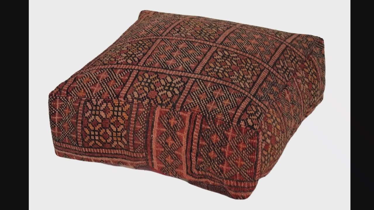 Video of vintage Moroccan rug pouf terracotta red showing texture and Berber details 