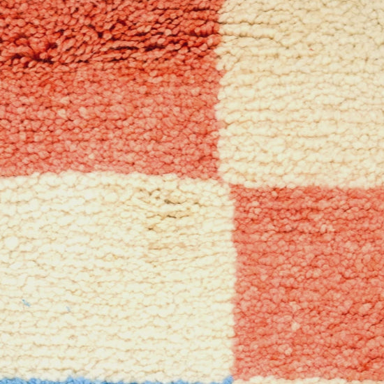 Video close-up of chequered pattern moroccan rug carpet