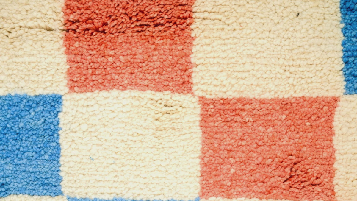 Video close-up of chequered pattern moroccan rug carpet