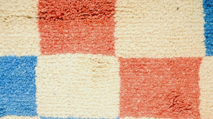 Video close-up of chequered pattern moroccan rug carpet