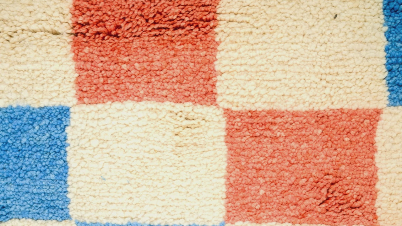 Video close-up of chequered pattern moroccan rug carpet