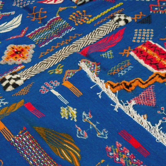 close-up video  of a moroccan blue rug