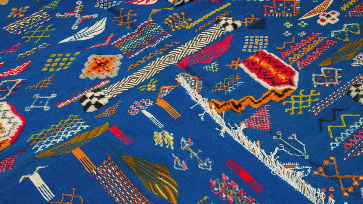 close-up video  of a moroccan blue rug