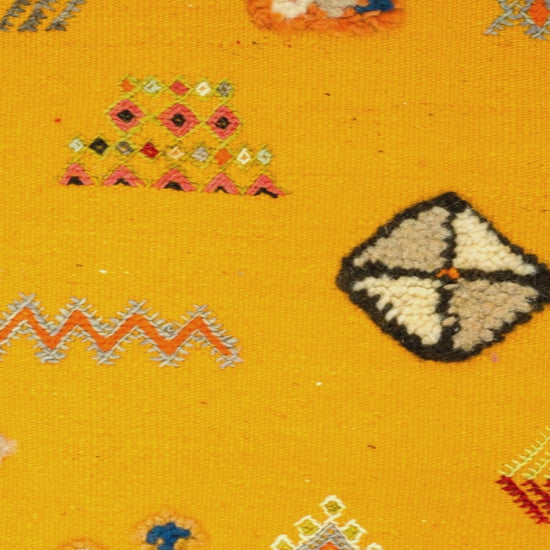 video close-up of yellow moroccan rug