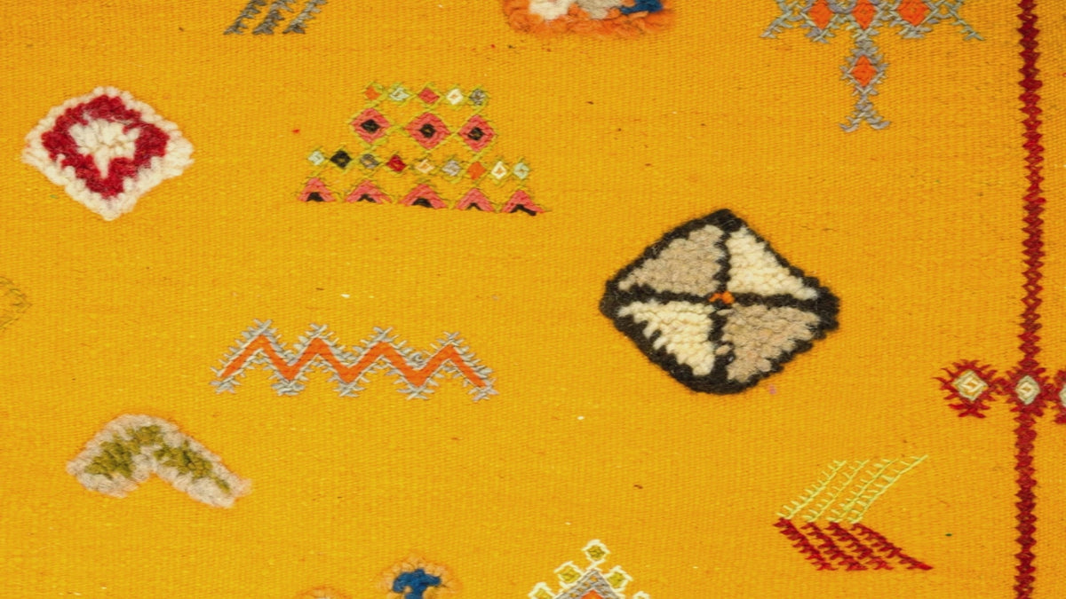 video close-up of yellow moroccan rug