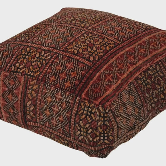 Video of vintage Moroccan rug pouf terracotta red showing texture and Berber details 