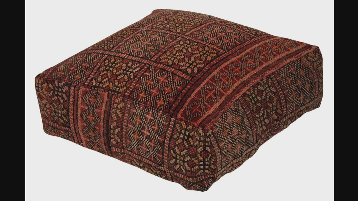 Video of vintage Moroccan rug pouf terracotta red showing texture and Berber details 