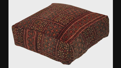 Video of vintage Moroccan rug pouf terracotta red showing texture and Berber details 
