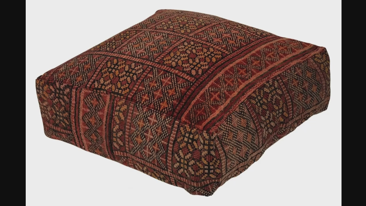 Video of vintage Moroccan rug pouf terracotta red showing texture and Berber details 